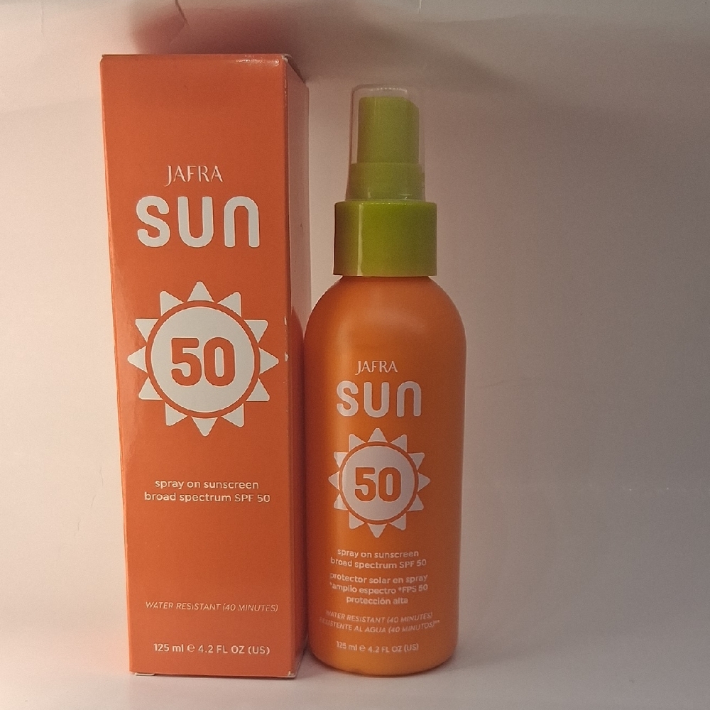 JAFRA Sun SPF 50 Orange Bottle with Green Spray Cap